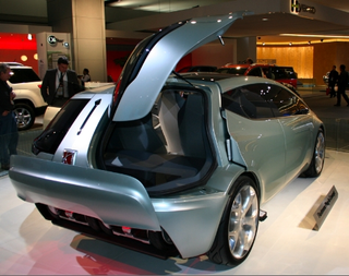 Illustration for article titled Detroit Auto Show: Top Five Concept Car Features That'll Never See Production
